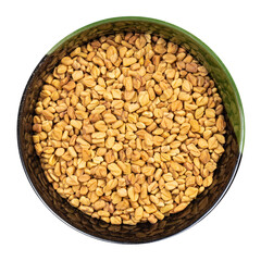 whole fenugreek seeds in round bowl isolated