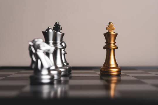 Closeup of chess characters on board games. to represent decision making in term of business strategy to find out the best solution to meet target objective and goal.	
