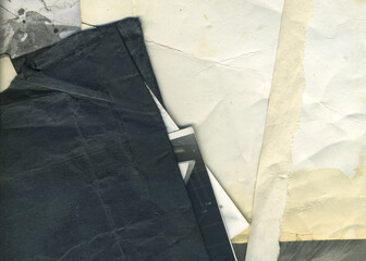 Old vintage monochrome photographs. Retro photo texture. Grunge background with old notebook and...