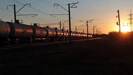 Fototapeta na wymiar Tanks with oil products at sunset