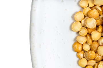 part of gray plate with dried split yellow peas