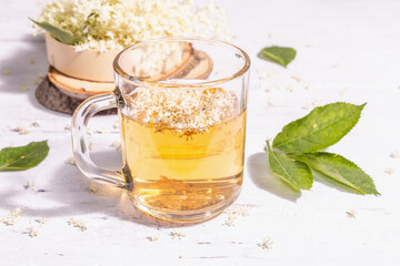 Elderberry flower tea. Refreshing summer drink, healthy lifestyle concept