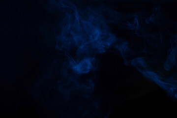 Blue and pink steam on a black background.