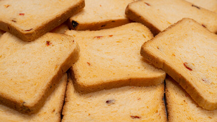 Delicious bread slices isolated on a white background.