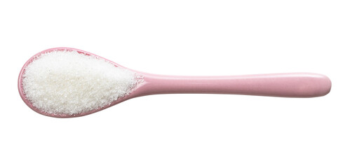 white refined beet sugar in pink ceramic spoon