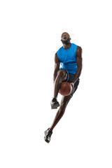 Full length portrait of a basketball player with a ball isolated on white studio background. advertising concept. Fit african american athlete jumping with ball.