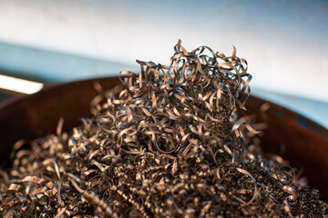 Closeup machined steel  twisted spiral steel in tank