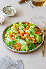 Salad with shrimp, cucumbers and avocado. Healthy eating. Vegetarian food.