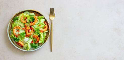 Salad with shrimp, cucumbers and avocado. Healthy eating. Vegetarian food.