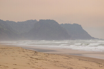 Fototapeta na wymiar Landscape view from the beach coast. Foggy day