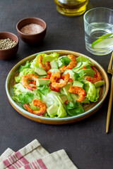 Salad with shrimp, cucumbers and avocado. Healthy eating. Vegetarian food.