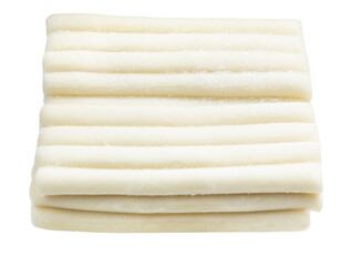 block of raw frozen tteokbokki isolated