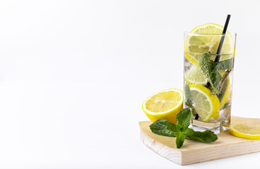 cocktail of lemons and mint on a wooden board 