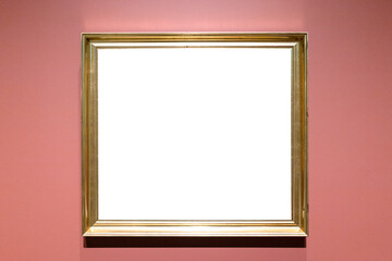classical golden picture frame on pink wall
