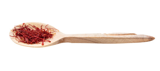 crocus saffron threads in wooden spoon isolated
