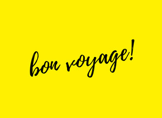 "Bon Voyage" means good trip in french language. Note with yellow background. Modern calligraphy.
