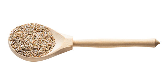 crushed rye groats in wooden spoon isolated
