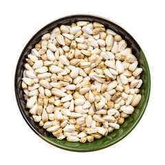 safflower seeds in round bowl isolated