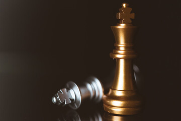 Closeup of chess characters on board games. to represent decision making in term of business strategy to find out the best solution to meet target objective and goal.	