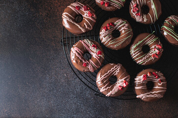 Homemade Chocolate Donuts with chocolate coating. National Donut Day. Homemade baking.