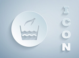 Paper cut Hand wash laundry icon isolated on grey background. Paper art style. Vector