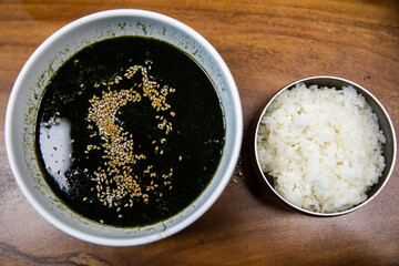 Seaweed fulvescens soup, Korean traditional food, boiled maesaenggi from the sea and added white sesame seeds