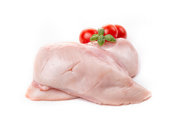 Chicken breast fillet decorated with tomatoes and basil on a white background.