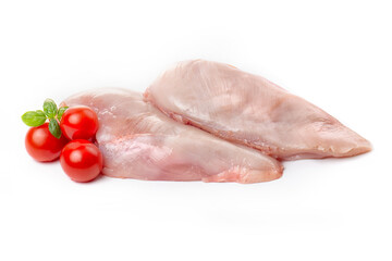 Chicken breast fillet decorated with tomatoes and basil on a white background.