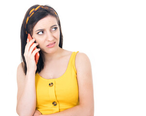 Grumpy woman talks on the phone, isolated on white background. Nuisance and smart phone