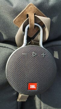 Waterproof round Bluetooth-speakers JBL Clip 3 in black color with a carabiner. Digital music and audio concept. Mini, suitable for travel. Ukraine, Kiev - June 09, 2021.