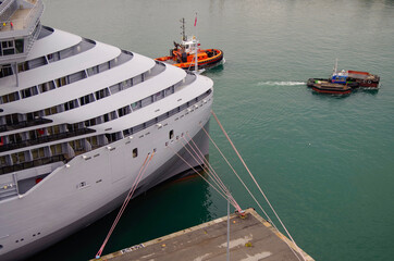 Futuristic modern cruiseship or cruise ship liner Scarlet Lady in red and grey in port of Genoa,...