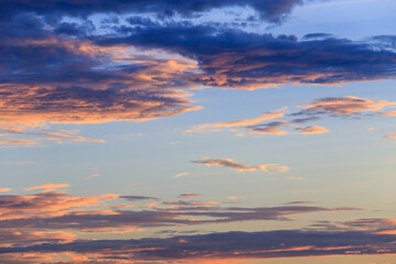 The sky changes color during sunset.