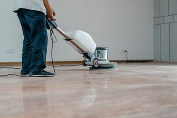 Fototapeta premium person cleaning floor