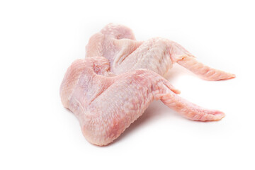 Raw chicken wings with skin on a white background.