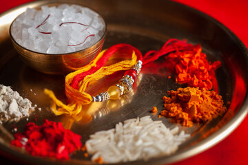 Close-up of puja thali (pooja plate) during preparation of Rakhsa Bhandhan. This festival is...