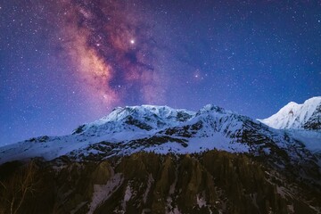 Fototapeta na wymiar Starry Dawn with Milky Way Galaxy Rising over Annapurna Mountain in Manang Nepal