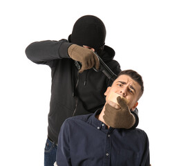 Terrorist aiming at hostage on white background