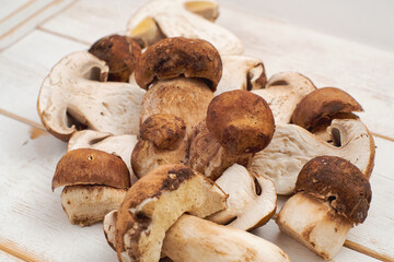 Wooden basket full of fresh boletus mushrooms