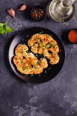 Cauliflower steak with spices cooked in the oven, top view.