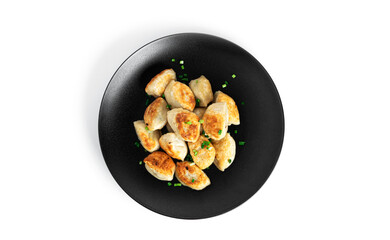 Fried dumplings with potatoes and green onion isolated on a white background.