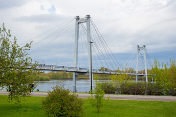 Foot Vinogradovsky (cable-stayed) bridge through the Yenisei river on Tatyshev island in Krasnoyarsk, Russia