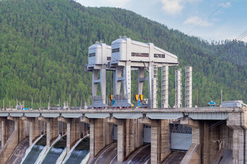 View on giant gantry cranes to hydroelectric power station of Krasnoyarsk dam located on the Yenisey River near Krasnoyarsk in Divnogorsk, Russia. This crane adjusts the valves during floods.