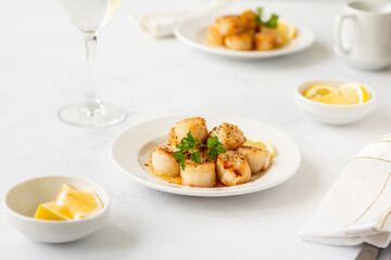 Fried scallops with butter lemon spicy sauce.
