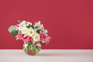 Vase with beautiful flowers on color background