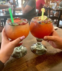 hand holding a cocktail