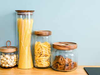 noodle, cookie, pasta are keeping in the jar
