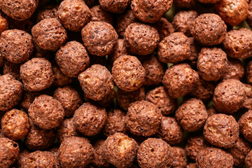 Chocolate corn balls as background, closeup