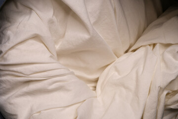 White linens in the washing machine.