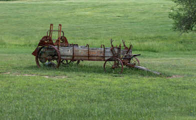 An Old Farm Wagon in Field