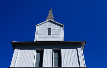 Hornefors, Norrland Sweden - May 23, 2021: part of bell tower on wooden church from the turn of the century
